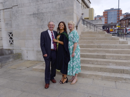 Family group on the steps of Parkinson Building